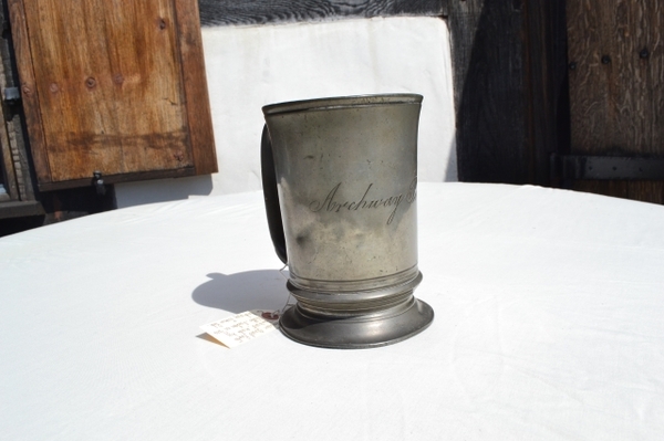 Discover our Victorian pewter tankard, a unique piece from Archway Tavern pub, made by Watts, Euston no. 256. Ideal for historical collectors, shop now!