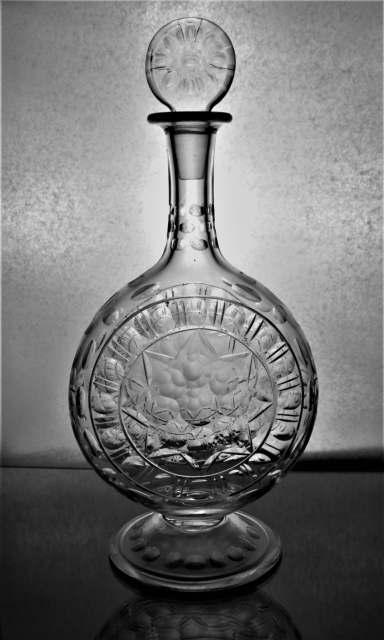 James Powell & Sons, Whitefrairs - A 'Clock-Face' Cut Decanter and Stopper.