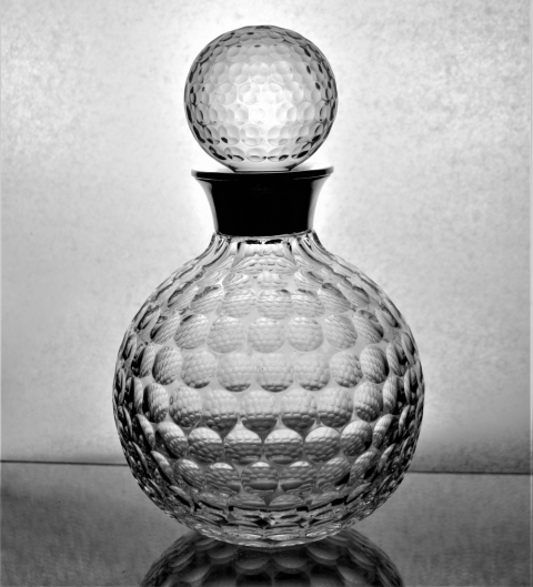 Discover our Silver Mounted English Crystal Decanter, a unique piece by Bishton Ltd from 1995. Crafted to resemble a golf ball, it's a collector's dream! Shop now!