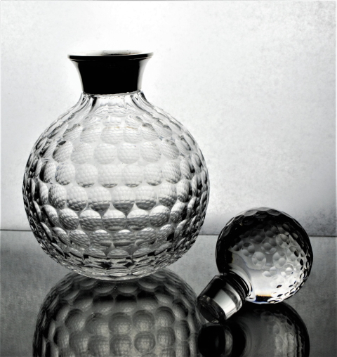 Discover our Silver Mounted English Crystal Decanter, a unique piece by Bishton Ltd from 1995. Crafted to resemble a golf ball, it's a collector's dream! Shop now!