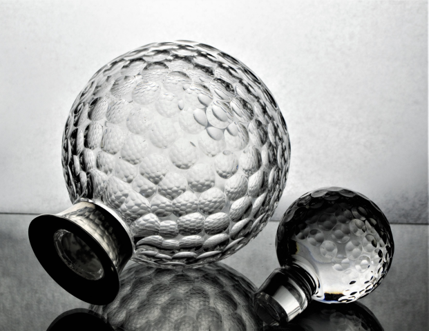 Discover our Silver Mounted English Crystal Decanter, a unique piece by Bishton Ltd from 1995. Crafted to resemble a golf ball, it's a collector's dream! Shop now!