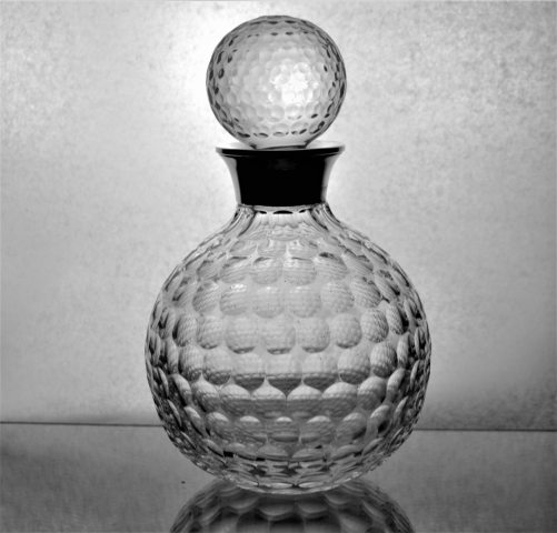 Discover our Silver Mounted English Crystal Decanter, a unique piece by Bishton Ltd from 1995. Crafted to resemble a golf ball, it's a collector's dream! Shop now!