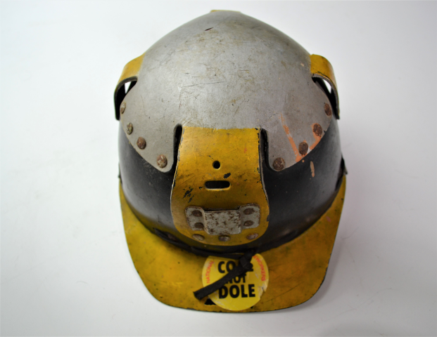 Discover our range of authentic 1980s coal miners' helmets. Own a piece of history with our Coal, not dole stickered helmets in good condition. Shop now!
