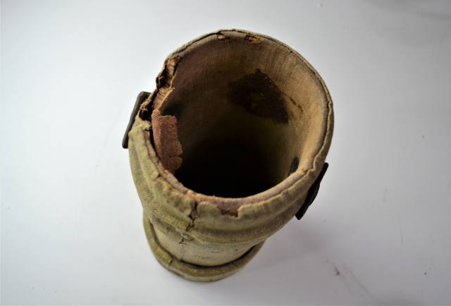 Explore our collection of Edwardian cordite carriers! Featuring a Kings crown emblem and in reasonable condition. Don't miss out, buy now!