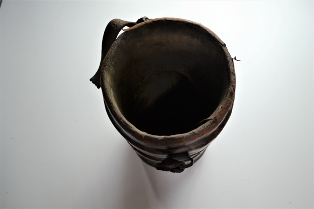 Discover our range of antique military memorabilia, featuring an early 20th-century leather cordite carrier. Act now to add a piece of history to your collection!