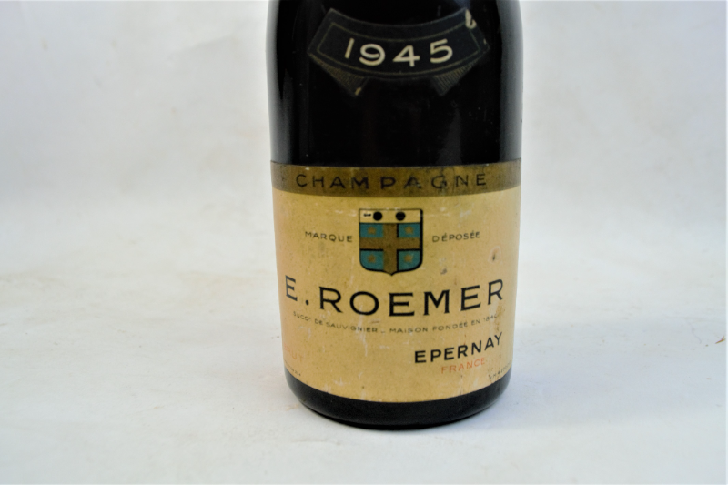 Discover our exclusive E. Roemer Champagne Half Bottle, dated 1945. Celebrate with this unique piece from Epernay, France. Shop now for this unopened, vintage gem!