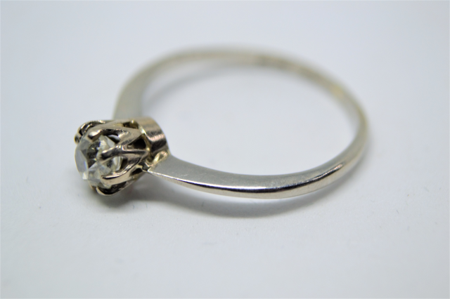 A Solitaire Diamond Platinum Ring.  