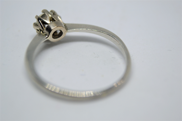 A Solitaire Diamond Platinum Ring.  