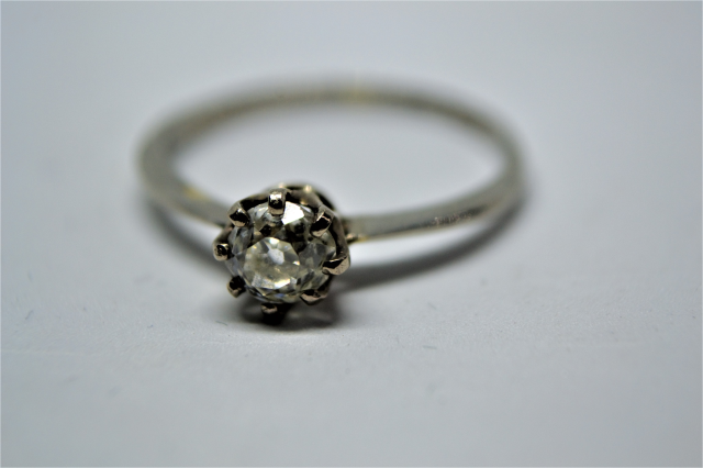 A Solitaire Diamond Platinum Ring.  