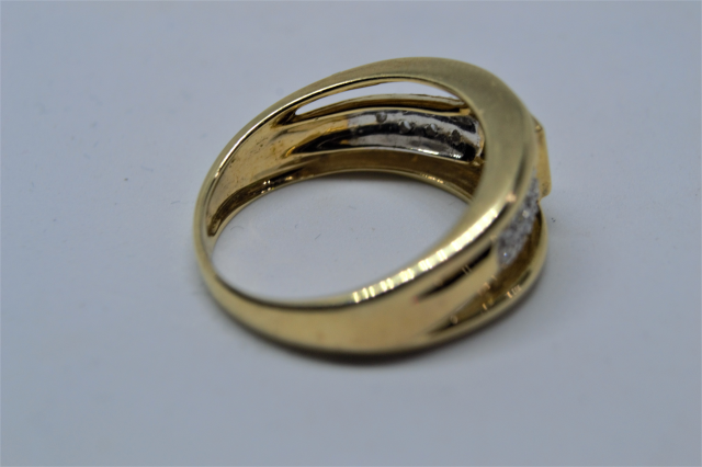 A 9ct Gold Emerald and Diamond Ring. 