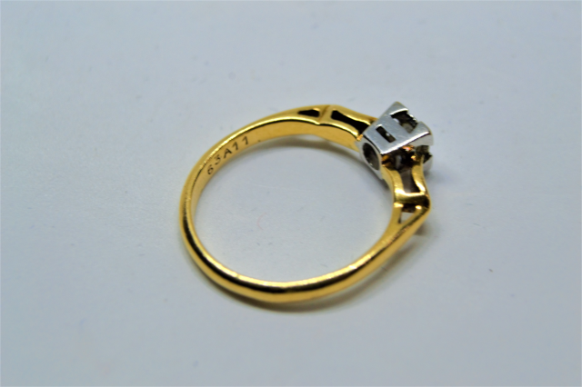 An 18ct Gold With Platinum Setting Solitaire Diamond Ring.