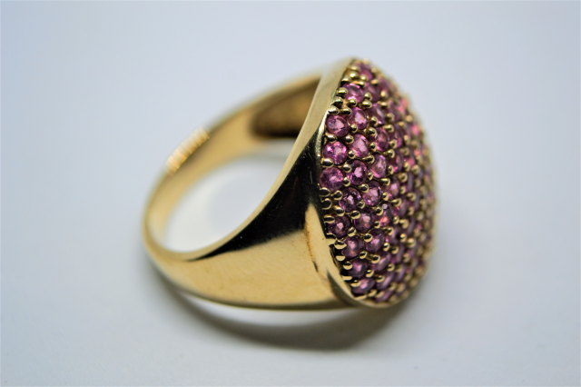 A 9ct Gold With Pink Stone Dress Ring.
