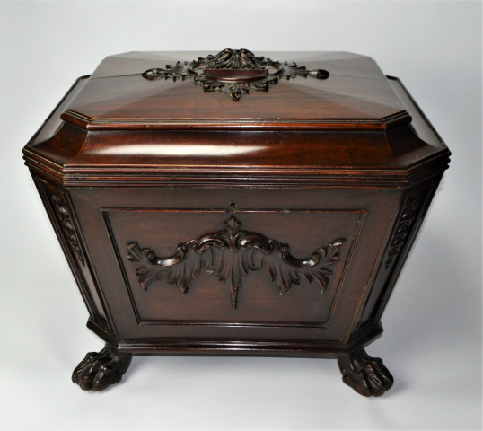 Experience elegance with our late Regency mahogany sarcophagus wine cooler. Stunningly carved with lion's paw feet and lead-lined interior. Shop now. Size: 70x56x60cm.