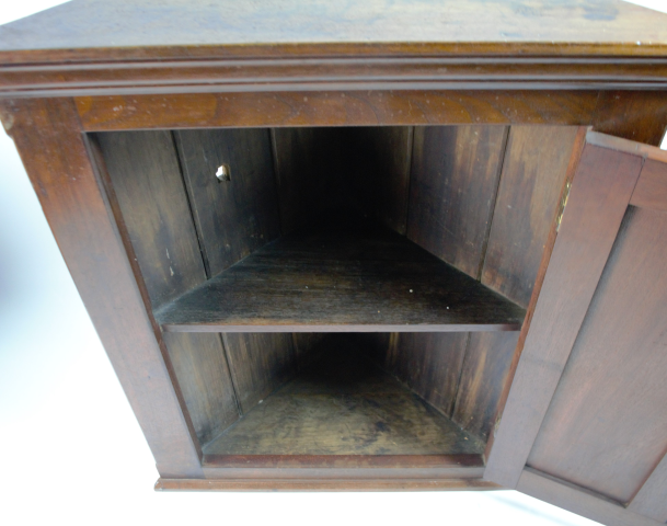 Discover our 19th-century small Oak corner cupboard in good condition, 72cm high x 56cm across the front. Explore now for unique antique furnishings!