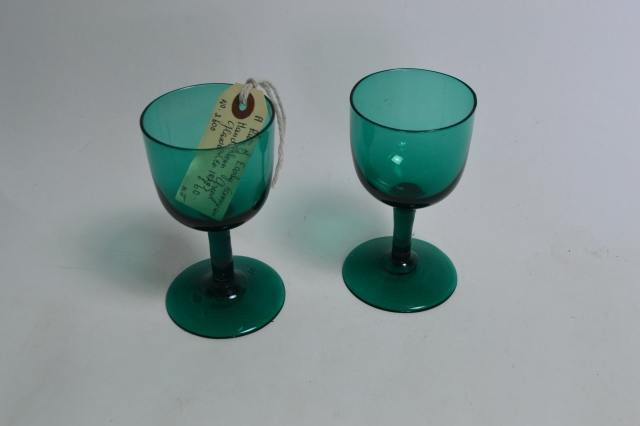 Discover our elegant pair of Georgian green wine glasses, a perfect addition to your table. Shop now for these unique, hand-crafted pieces with intricate detailing.