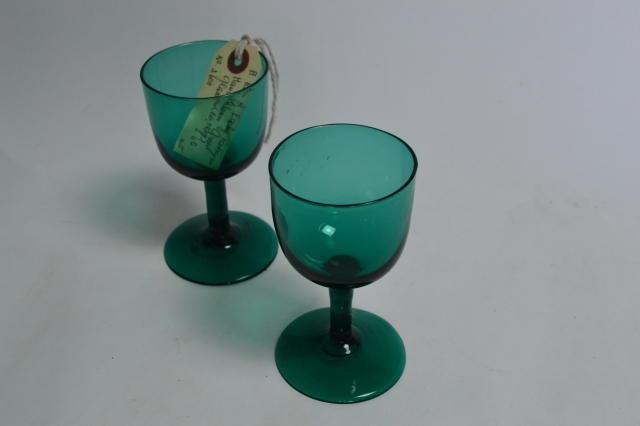 Discover our elegant pair of Georgian green wine glasses, a perfect addition to your table. Shop now for these unique, hand-crafted pieces with intricate detailing.