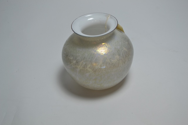 Discover our range of stunning Royal Brierley blue iridescent glass. Standing proudly at 18cm high, it's the perfect piece for any collection. Shop now and transform your space!