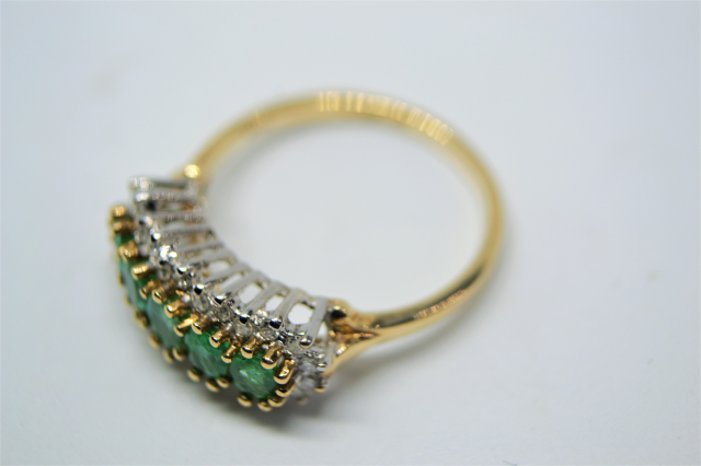 Discover our 9ct gold ring, studded with emeralds and diamonds. Expertly crafted in Sheffield. Weighs 2.9g, size N. Shop now to add a touch of luxury to your collection.