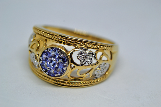 A 9ct Gold Tanzanite and Diamond Dress Ring.