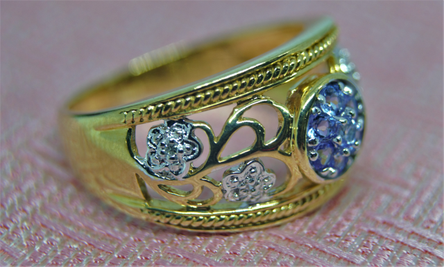 A 9ct Gold Tanzanite and Diamond Dress Ring.