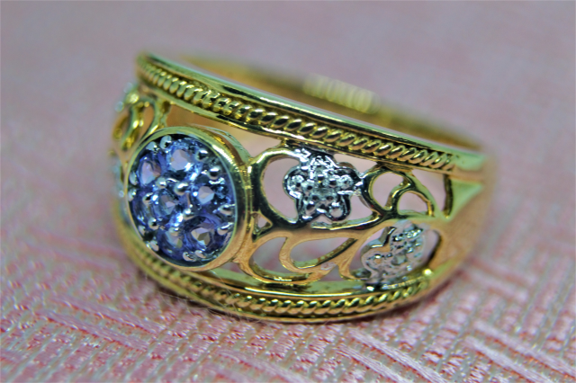 A 9ct Gold Tanzanite and Diamond Dress Ring.