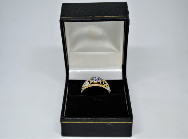 A 9ct Gold Tanzanite and Diamond Dress Ring.