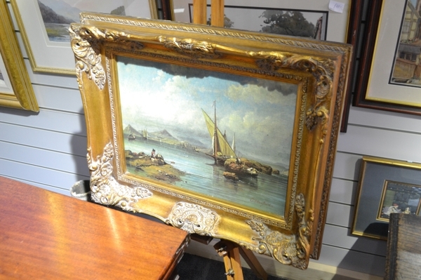 A Print With Thick Gold Frame