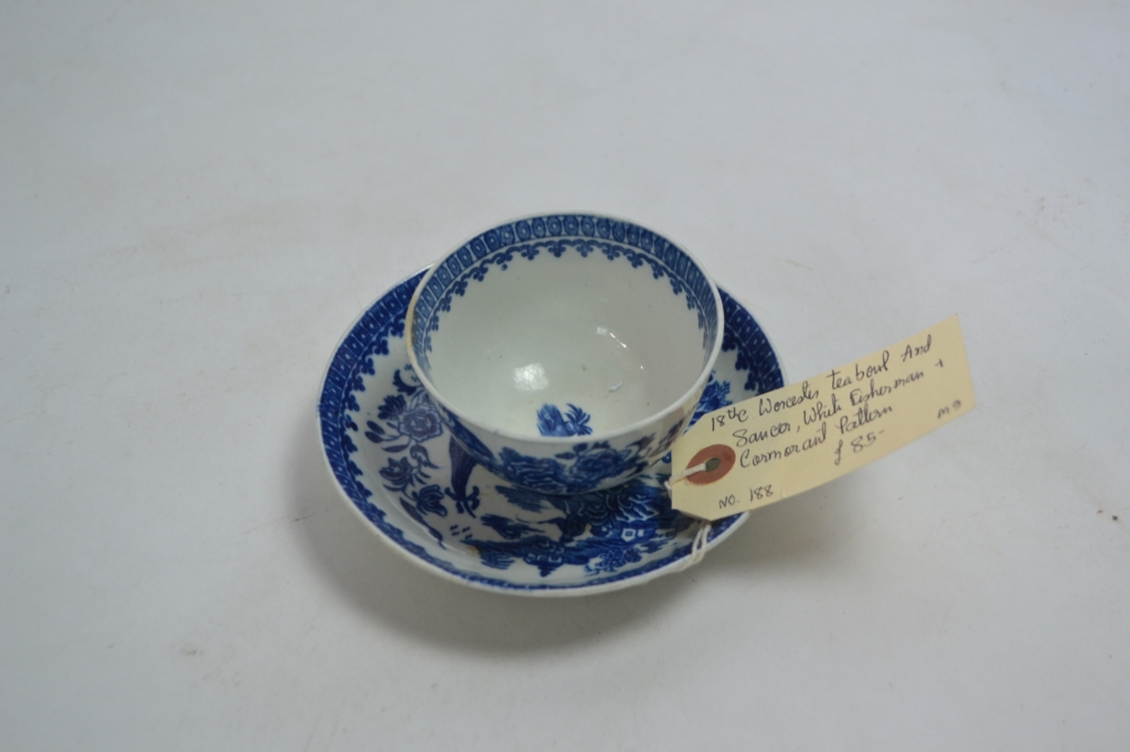 A Late 18th Century Worcester Teabowl and Saucer Decorated in the Underglaze Blue and White Fisherman and Cormorant Pattern