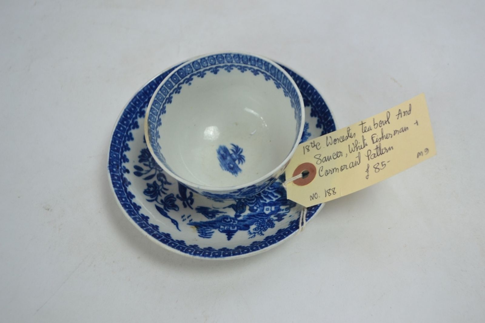 A Late 18th Century Worcester Teabowl and Saucer Decorated in the Underglaze Blue and White Fisherman and Cormorant Pattern