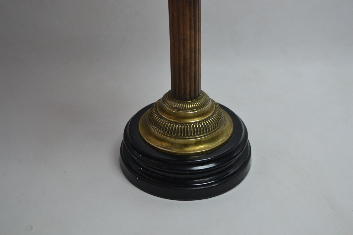 Discover our collection of exquisite Victorian cranberry glass oil lamps. This particular 27 piece boasts a unique wooden and brass stand. Shop now for antique treasures!