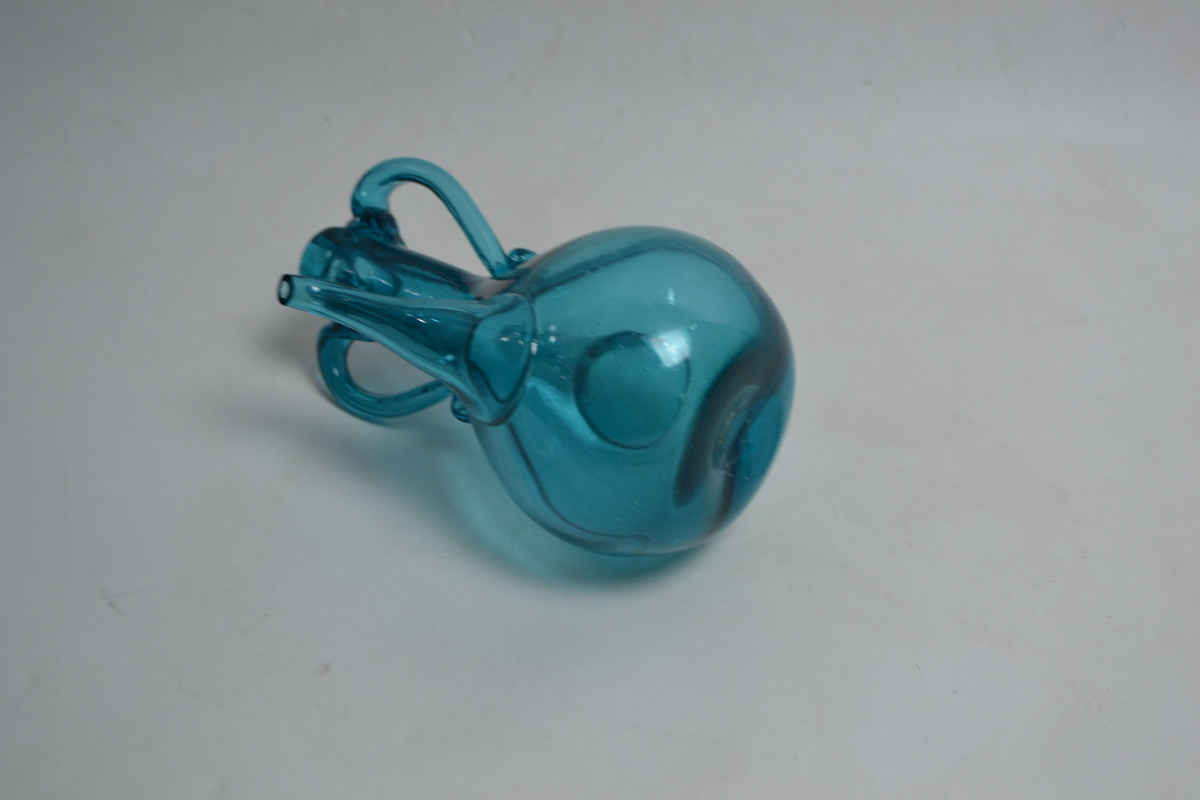 Discover our collection of 19th century Bristol green handblown vinegar bottles. Perfect for antique enthusiasts! Shop now and add a piece of history to your collection.