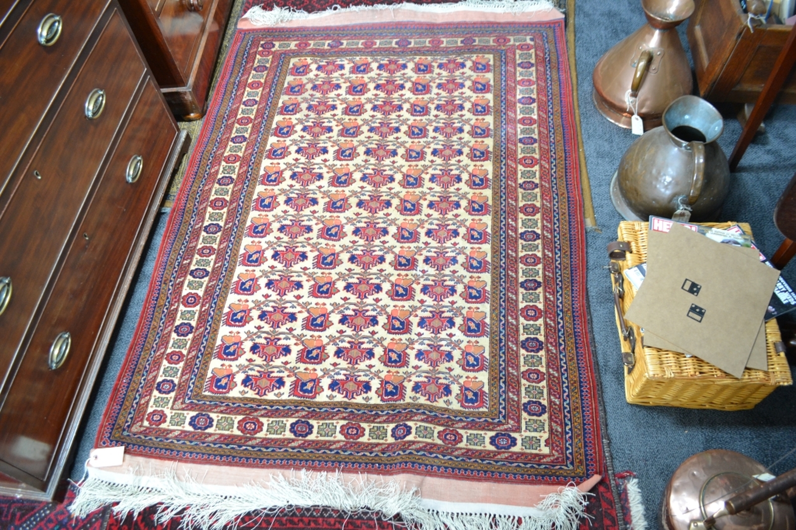 Discover our wide range of Turkish fringed carpets in cream ground with intricate designs in red and blue. Order now to enhance your home's aesthetic appeal!