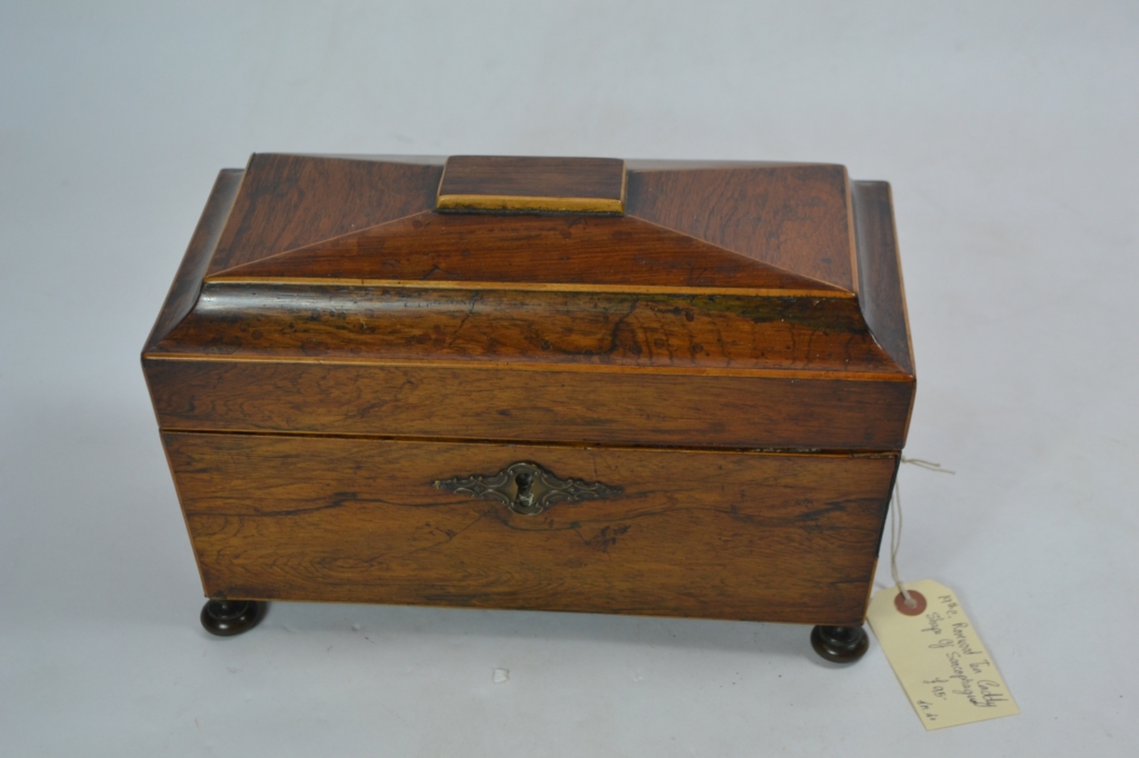 19th century rosewood tea caddy, of sarcophagus form 