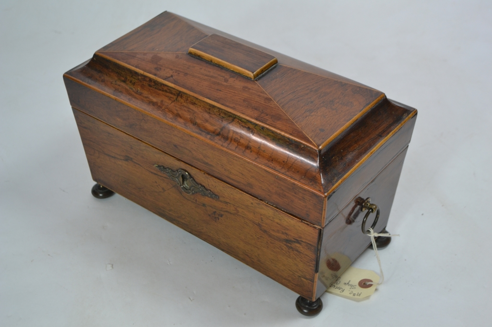 19th century rosewood tea caddy, of sarcophagus form 