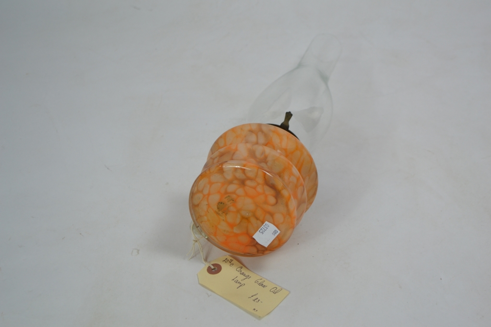 Early 20th century glass oil lamp with mottled orange reservoir