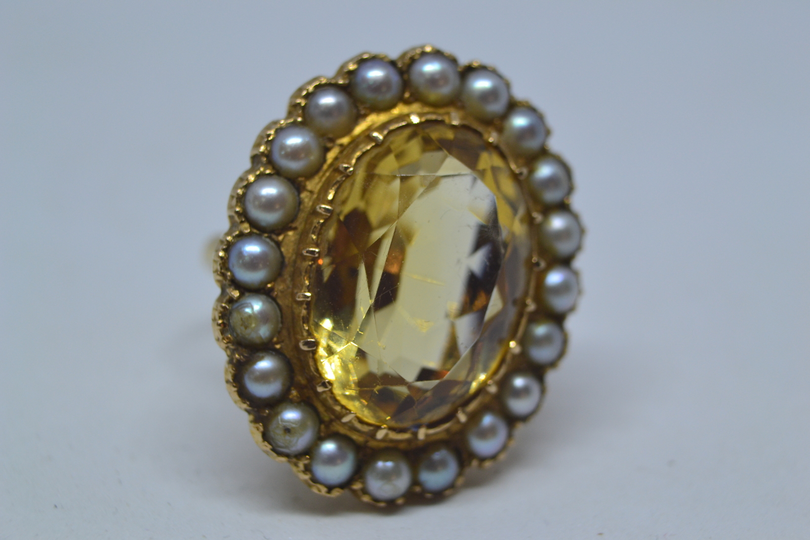 Explore our range of vintage gold rings! This 9ct gold, citrine and pearl cluster ring hailing from 1967 awaits. Unique in its design and superb in quality. Don't miss. Shop Now!
