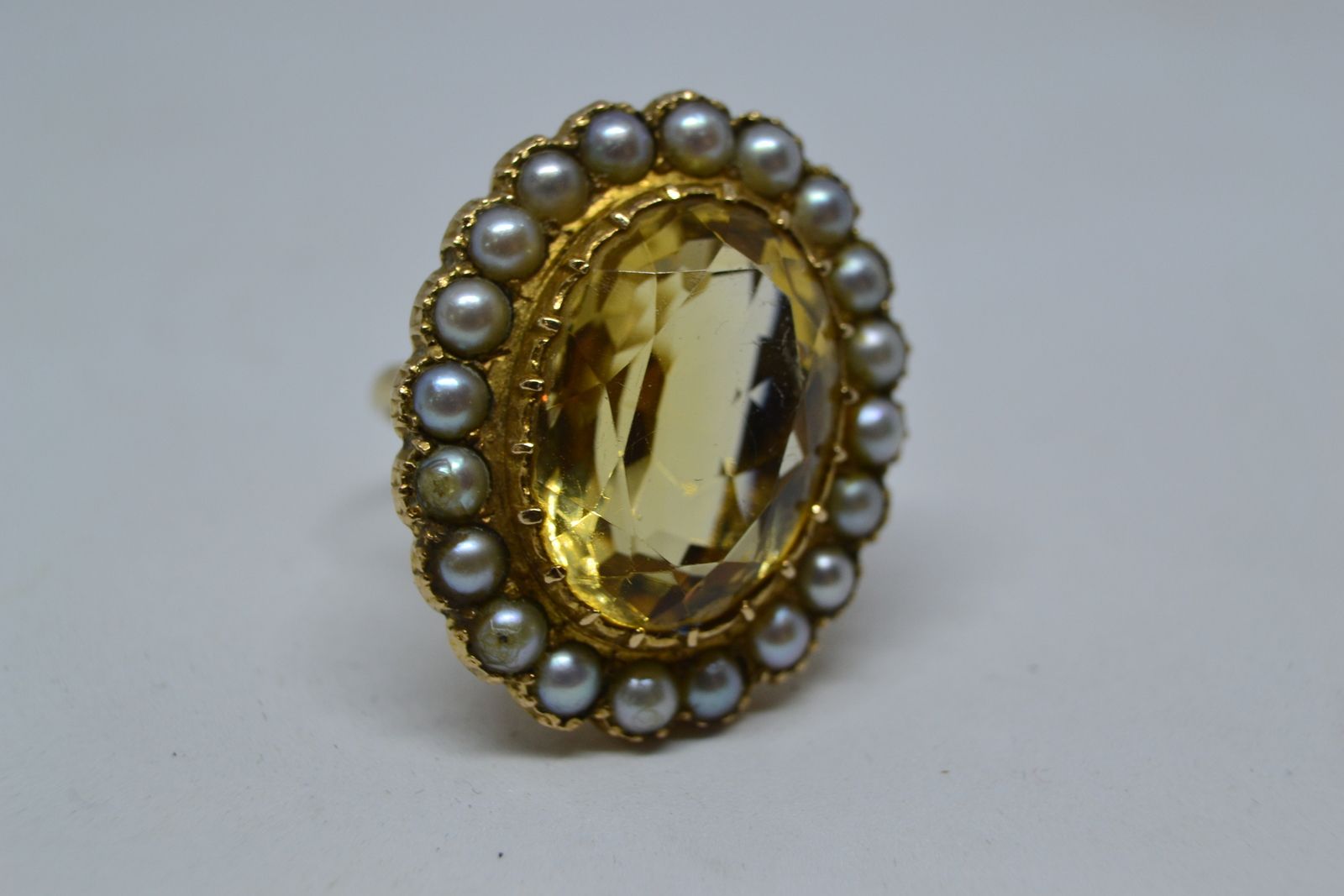 Explore our range of vintage gold rings! This 9ct gold, citrine and pearl cluster ring hailing from 1967 awaits. Unique in its design and superb in quality. Don't miss. Shop Now!