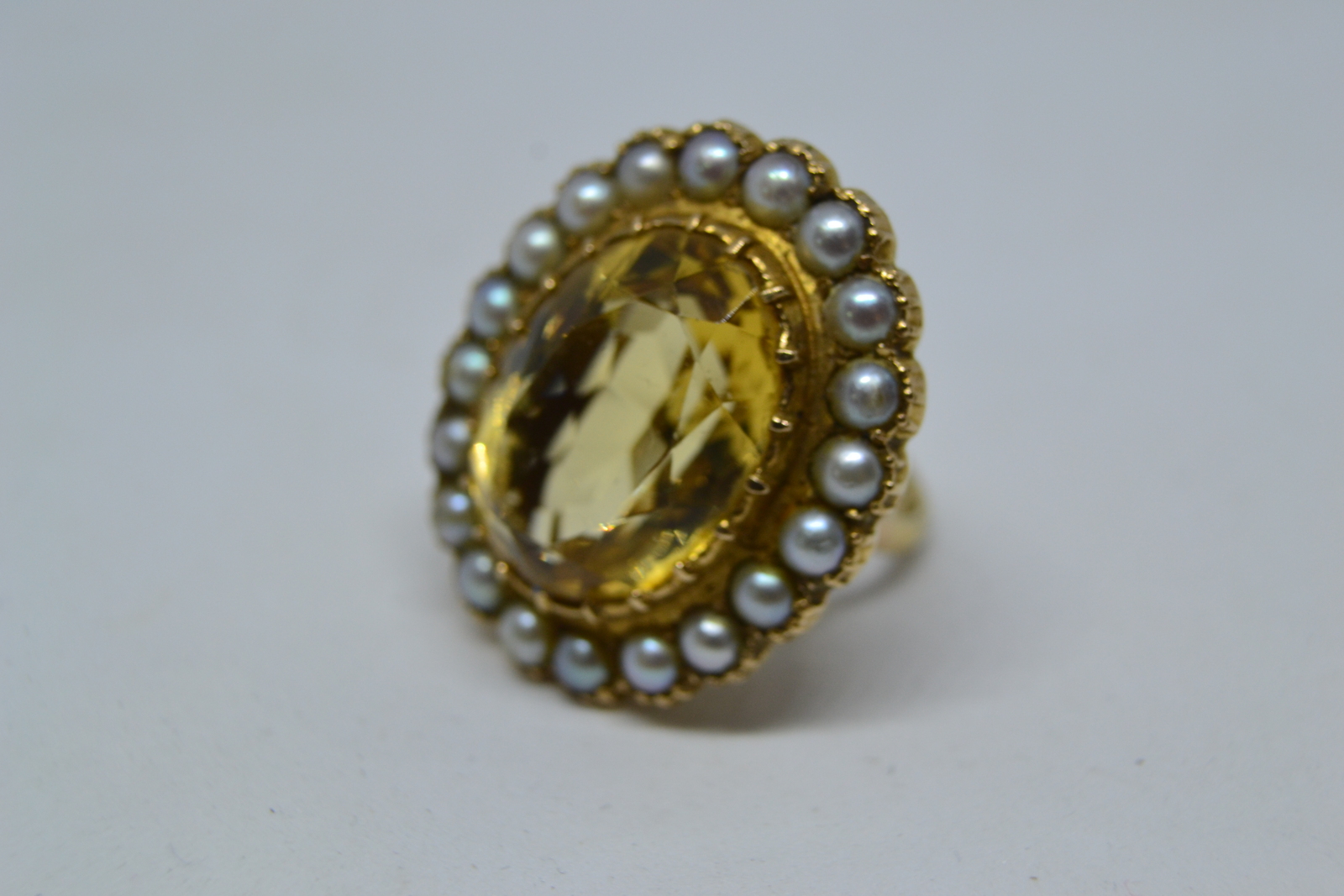 Explore our range of vintage gold rings! This 9ct gold, citrine and pearl cluster ring hailing from 1967 awaits. Unique in its design and superb in quality. Don't miss. Shop Now!