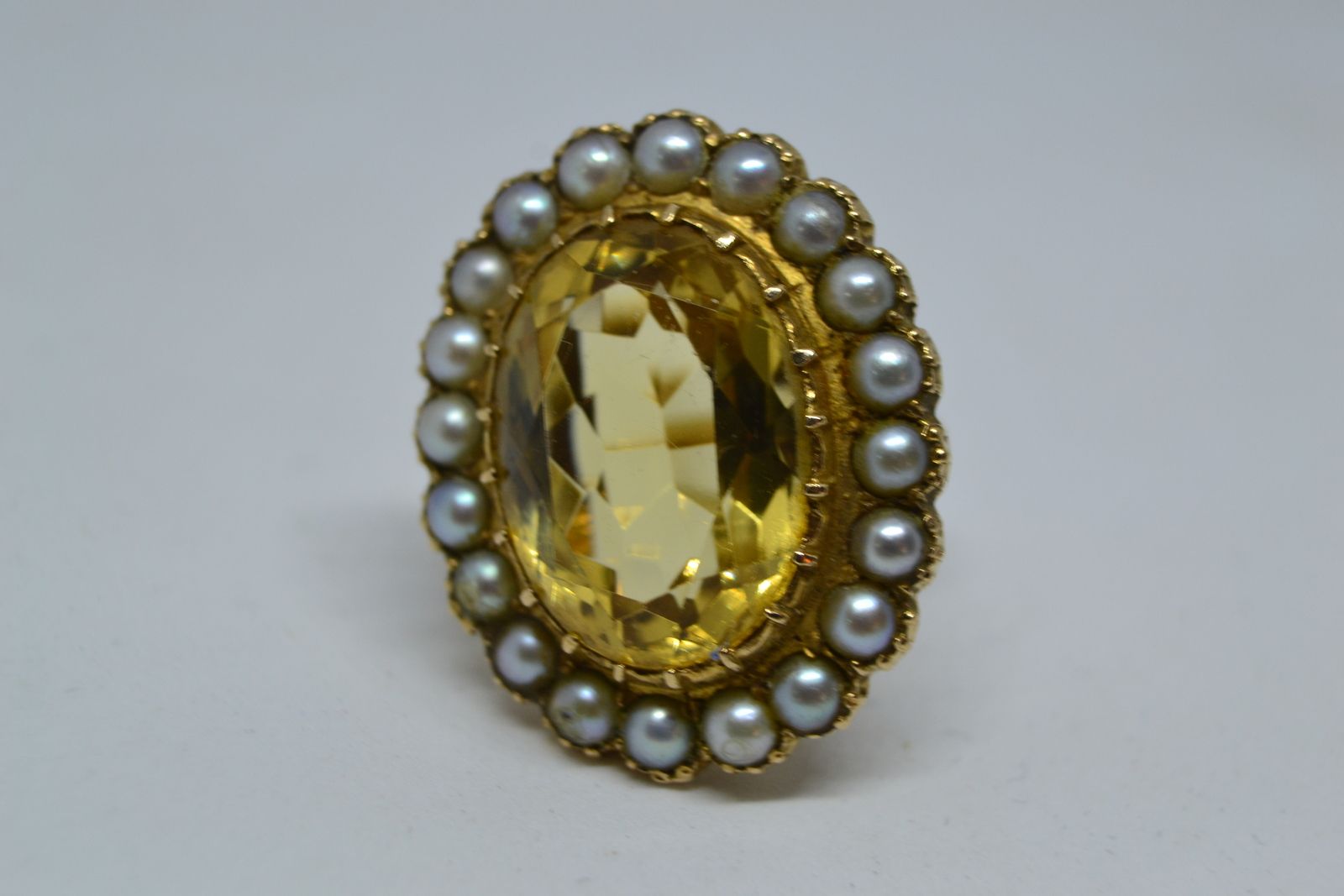 Explore our range of vintage gold rings! This 9ct gold, citrine and pearl cluster ring hailing from 1967 awaits. Unique in its design and superb in quality. Don't miss. Shop Now!