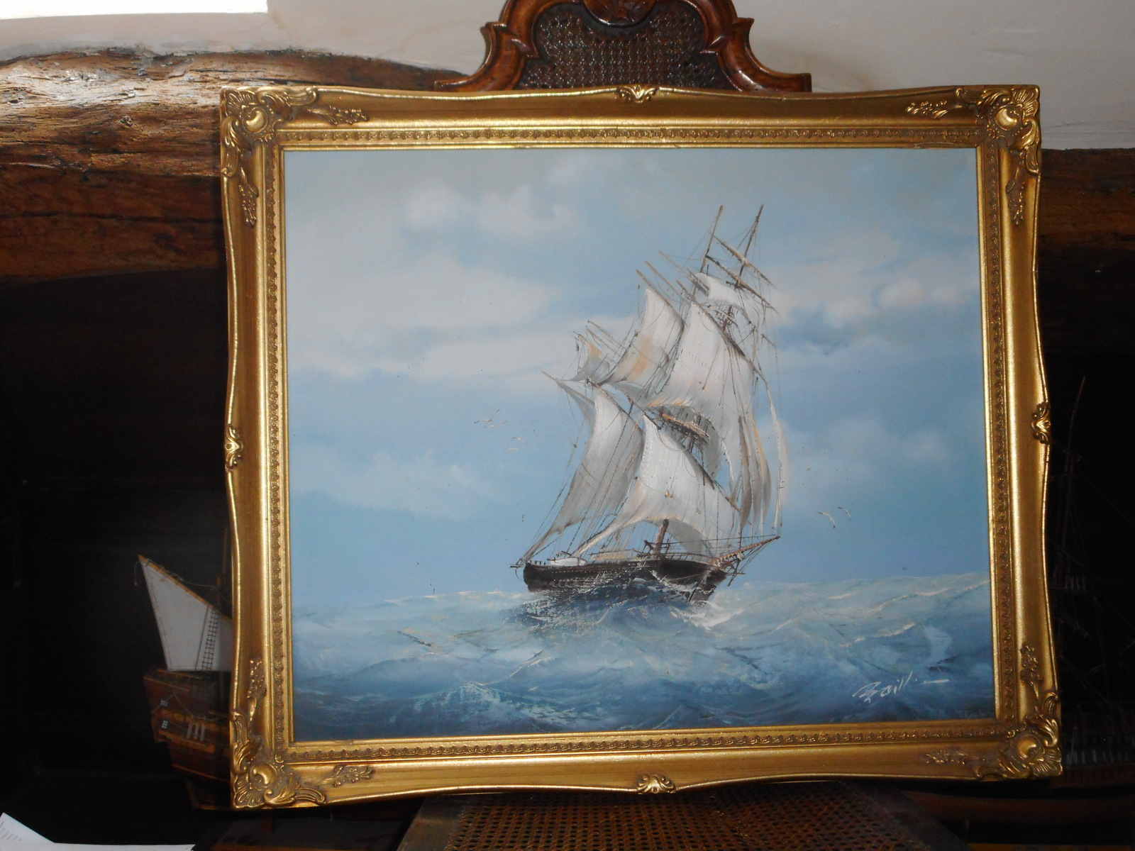 Discover Baill's exquisite sailing ship oil painting on a 25x20 inch canvas. Explore the golden motifs on its gilt swept frame. Don't miss out, buy now!