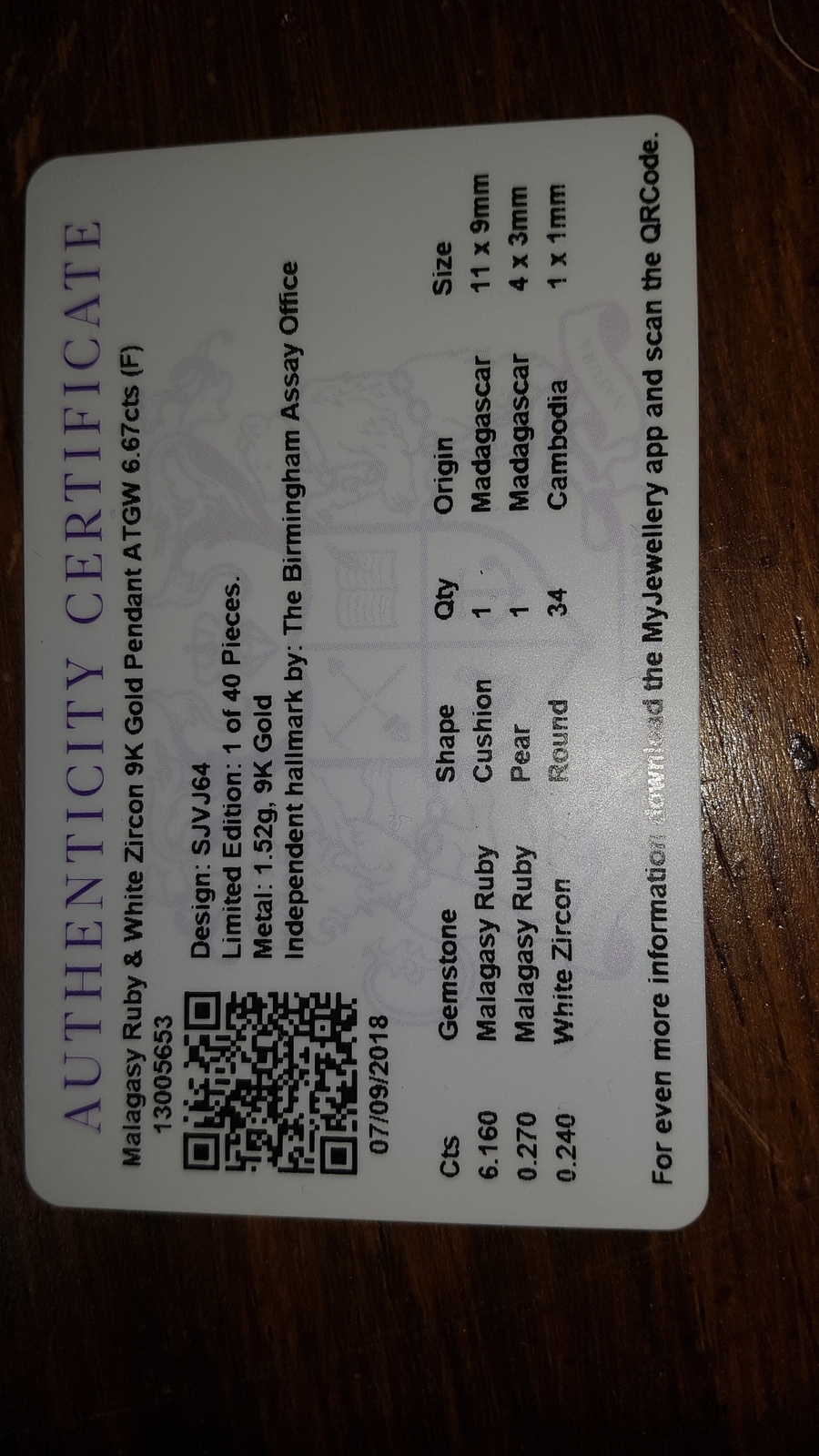 Discover our stunning pear-shaped ruby pendant, encrusted with sparkly zircons and set in 9ct white gold. Certified by Birmingham Assay Office. Buy Now!