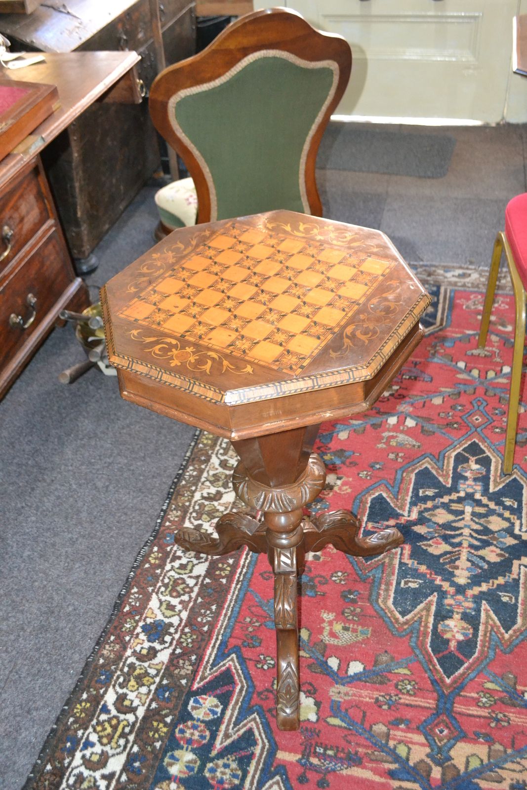 Discover our range of 19th century marquetry inlaid sewing tables. Featuring a chequer board top and unique tripod feet, measuring 75cm x 43cm in diameter. Shop now to add this vintage beauty to your collection.