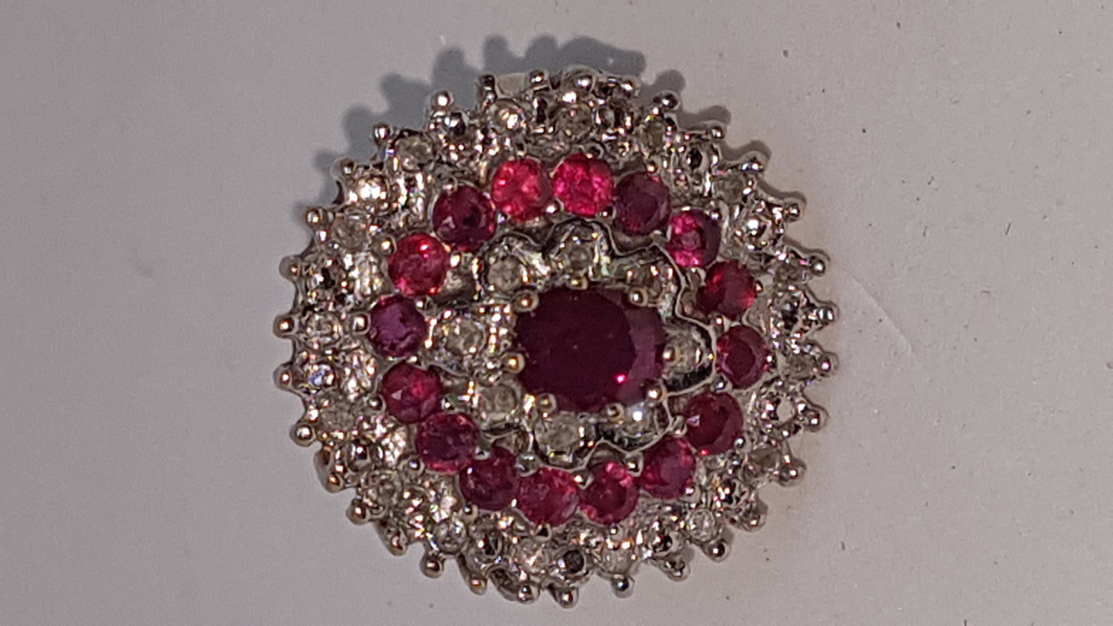 A 9ct Gold Ruby And Diamond Cluster Ring