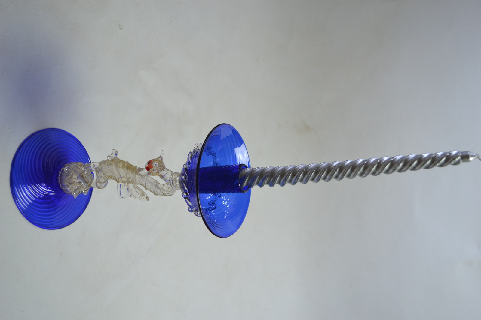 Discover our stunning Venetian glass candle holders by Murano. Expertly crafted, they add a touch of elegance to any decor. Shop now for the best selection!