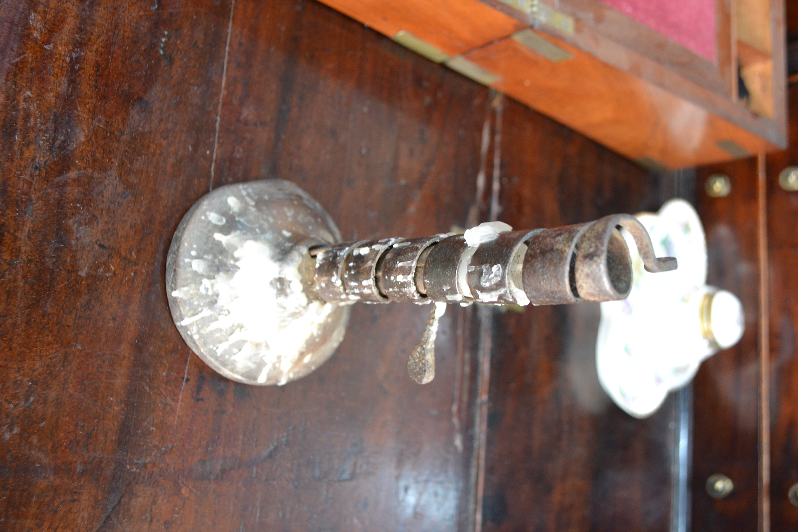 Discover our range of 18th century French adjustable Wine Cave candle holders. Crafted with wooden base and wall hook. Shop now to add vintage charm to your space!