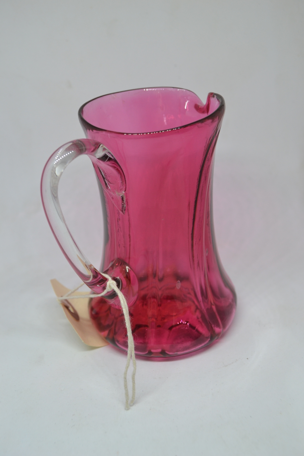 Discover our unique selection of antique Cranberry milk jugs, circa 1860. Explore top-class specifications and enhance your kitchen décor. Shop now!