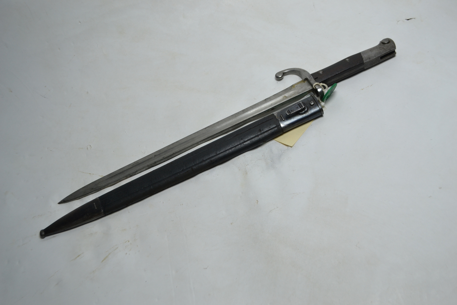 Discover our range of Brazilian 1908 bayonets, crafted in Czechoslovakia with attachable leather scabbards from Fabrica De Itajuba. Explore now for unique serial numbered pieces.