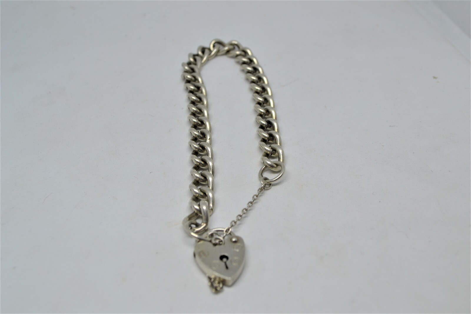 Solid Sterling Silver Curb Link Bracelet With Heart Padlock And Safety Chain.