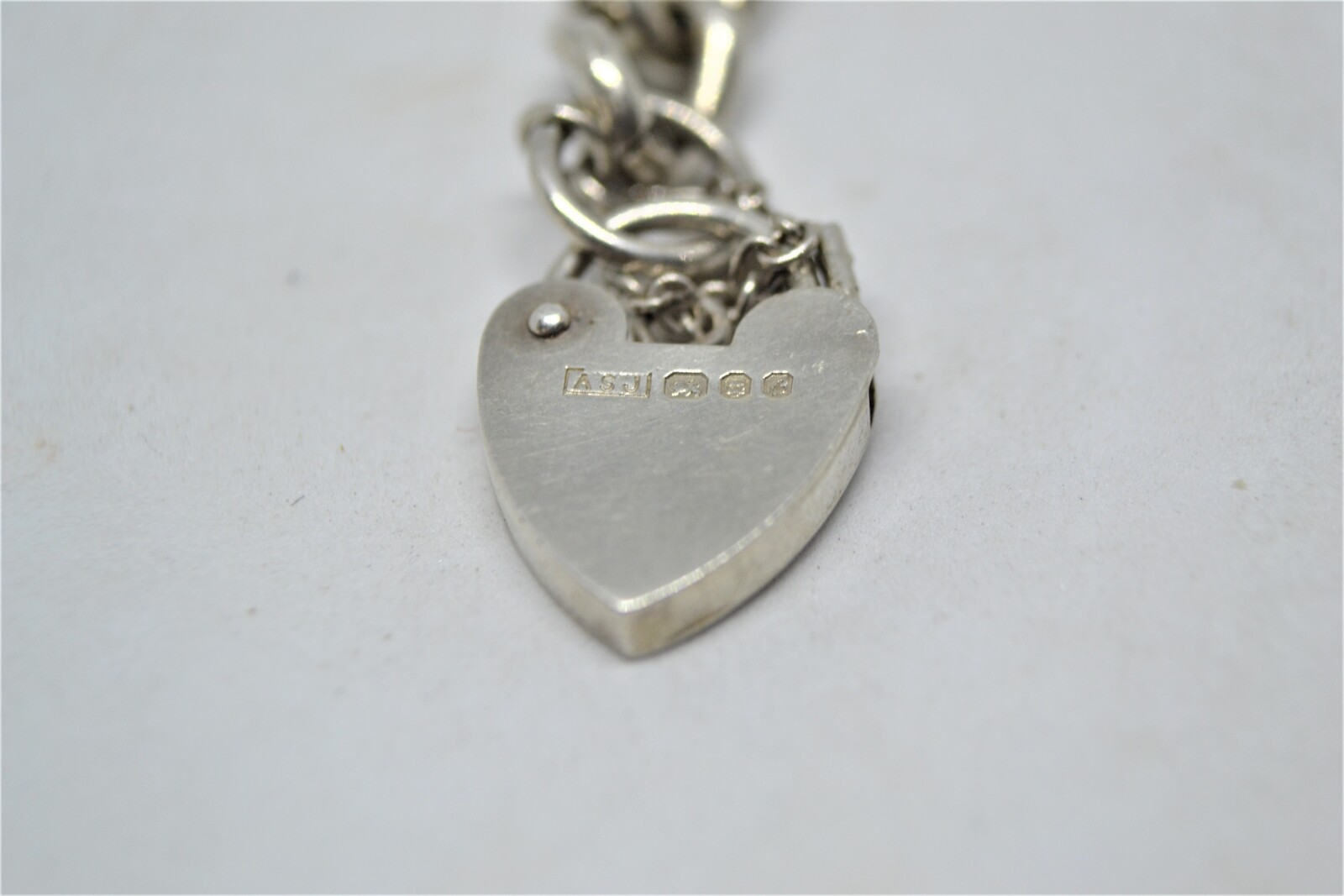 Solid Sterling Silver Curb Link Bracelet With Heart Padlock And Safety Chain.