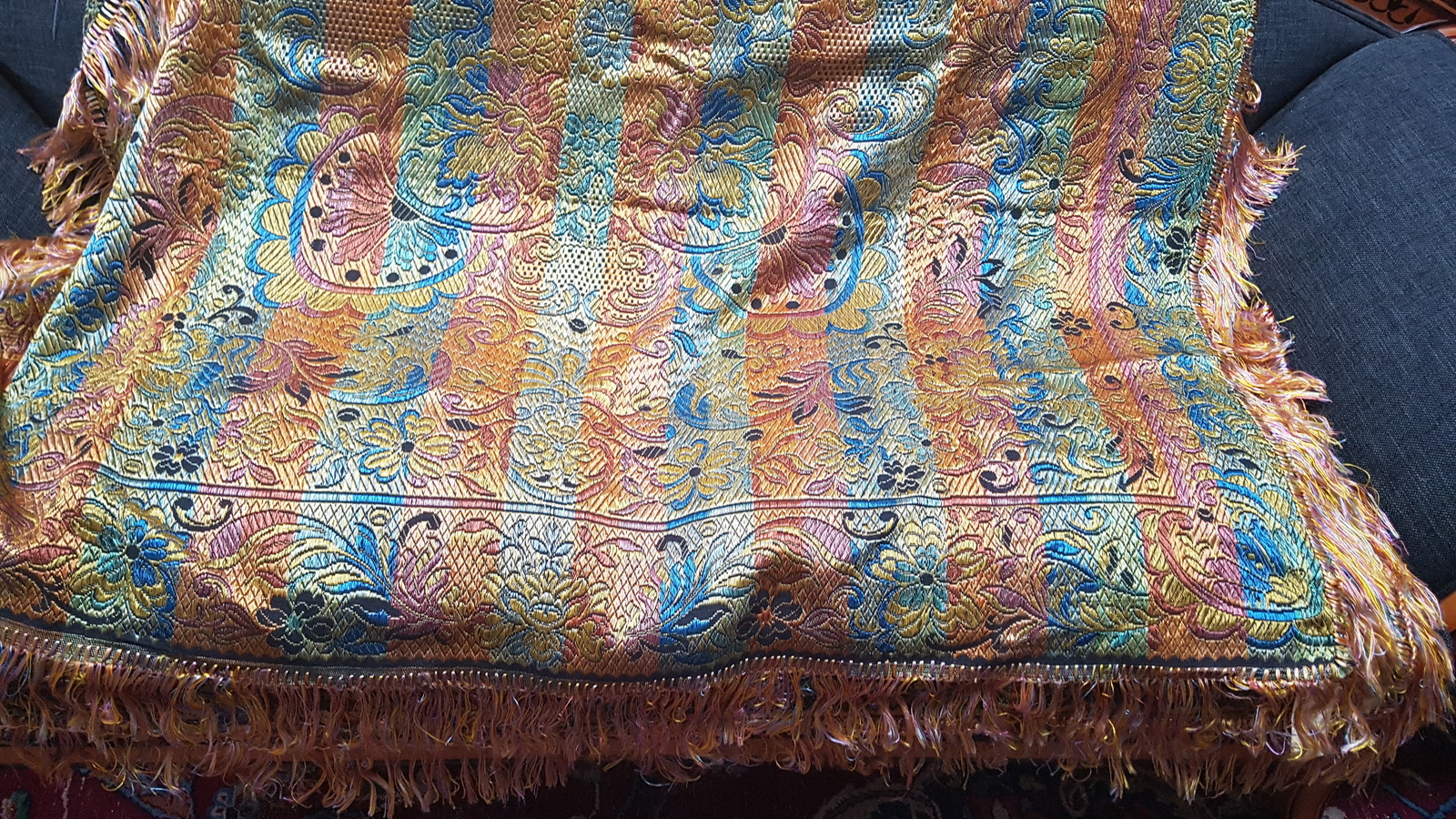 Discover our vintage Italian designer silk tapestry, handwoven and adorned with floral scrolls. Sourced from Paulo Rossini! Invest in this unique piece today.